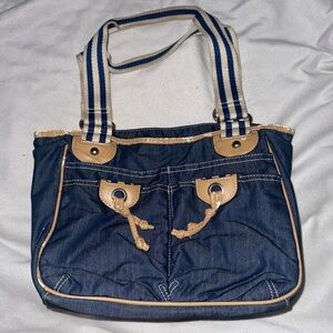 ST John bay woman’s look like blue jean purse